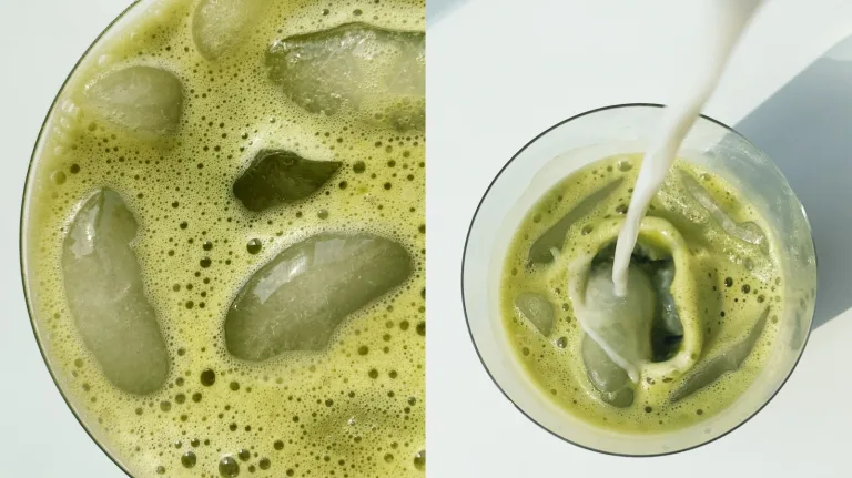 Iced green matcha latte with milk being poured into the glass.